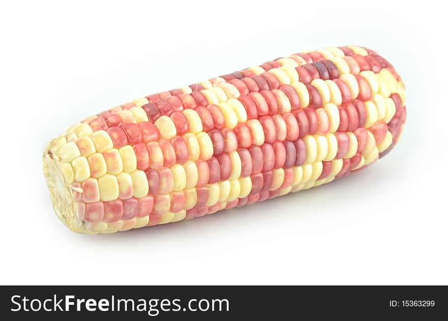 Red and yellow corn isolated on white