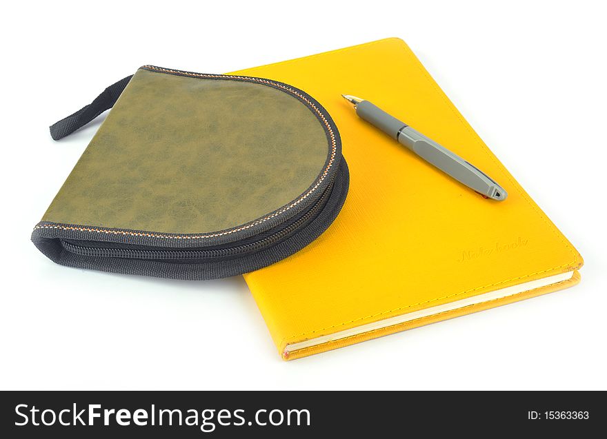 Ball pen, cd bag and memorandum in white background