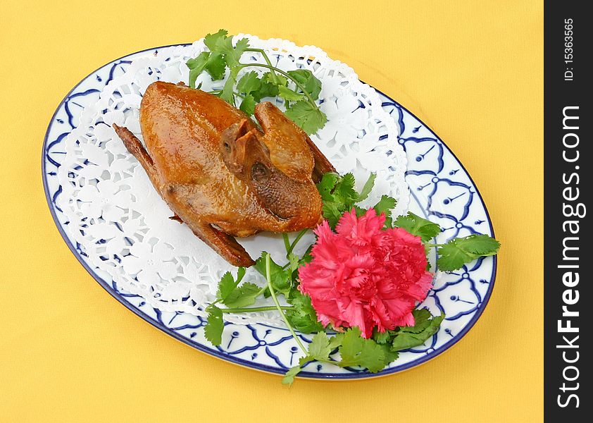 Crunchy fried pigeon on a plate