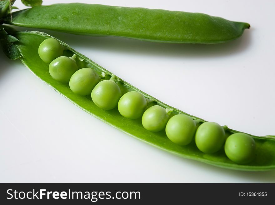 Very fresh garden green peas detail