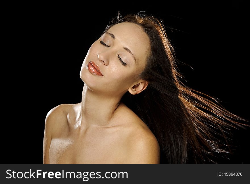 Attractive girl with perfect skin poses for a beauty portrait. Attractive girl with perfect skin poses for a beauty portrait