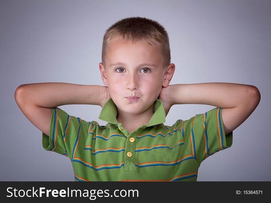 Pround romanian young boy in photo studio