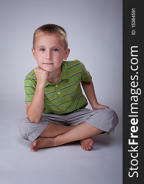 Young caucasian child in a photo studio. Young caucasian child in a photo studio