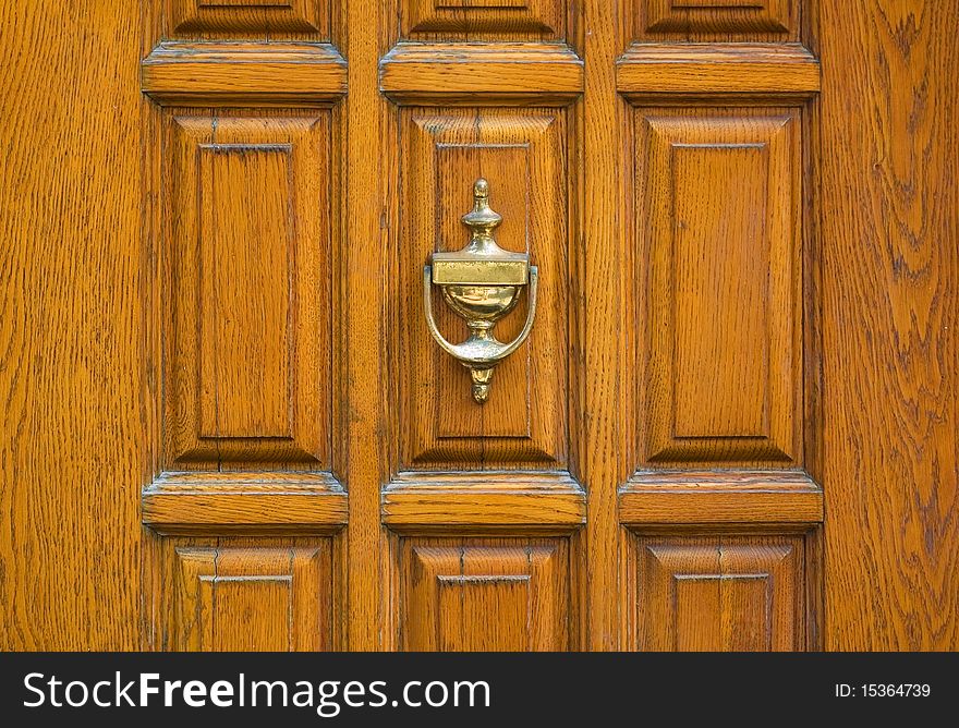 An old metal door handle knocker