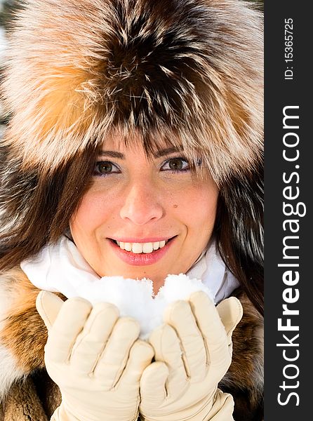 Portrait of young smiling woman with snow. Portrait of young smiling woman with snow