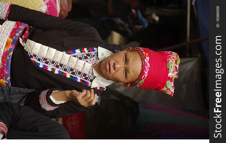 Portrait of a Woman Red Dao ethnic group in Muong Hum market, northern Vietnam near the Chinese border. Portrait of a Woman Red Dao ethnic group in Muong Hum market, northern Vietnam near the Chinese border