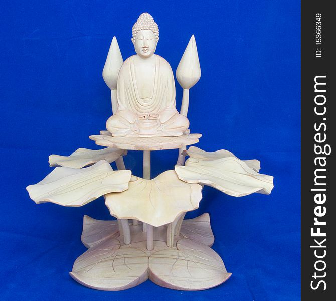 Meditating Buddha wood Statue on Lotus. Meditating Buddha wood Statue on Lotus