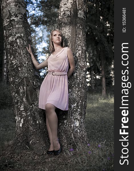 Portrait of a calm young woman in park. Portrait of a calm young woman in park