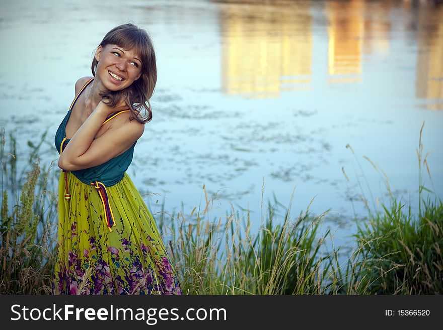 An attractive young woman walking on the lake. An attractive young woman walking on the lake