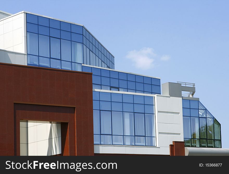 The modern office building a sunny day. The modern office building a sunny day.