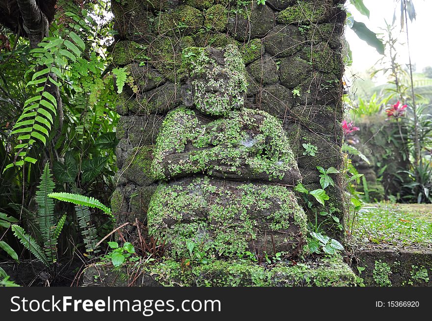 Old Mossy Guardian Stone Statue