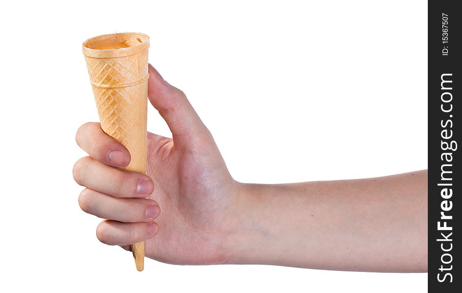 Empty ice cream cone in hand isolated on white. Empty ice cream cone in hand isolated on white