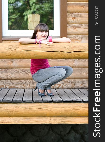 Girl sitting on a veranda. Girl sitting on a veranda