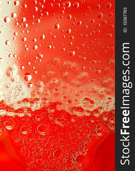 Water drops on red background