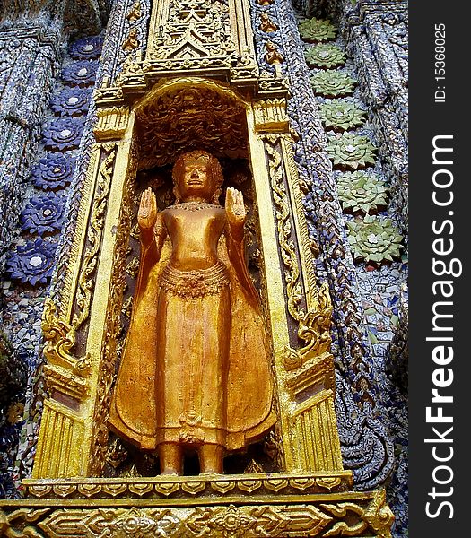 Beautiful golden buddha statue in a temple.The temple was located in central part of Thailand. Beautiful golden buddha statue in a temple.The temple was located in central part of Thailand