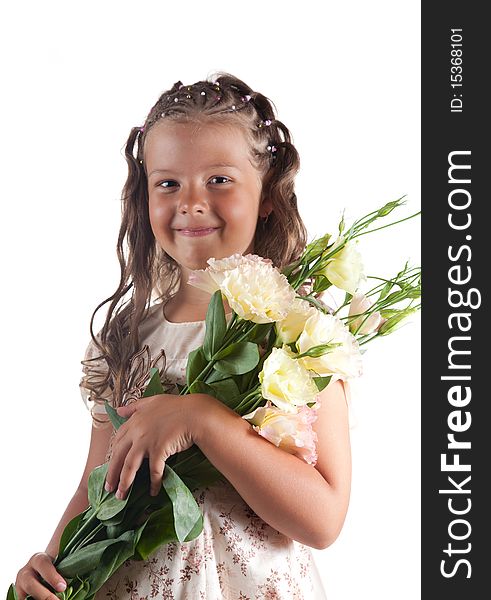 Smiling little girl with pigtail hairstyle holding flowers, isolated on white background. Smiling little girl with pigtail hairstyle holding flowers, isolated on white background