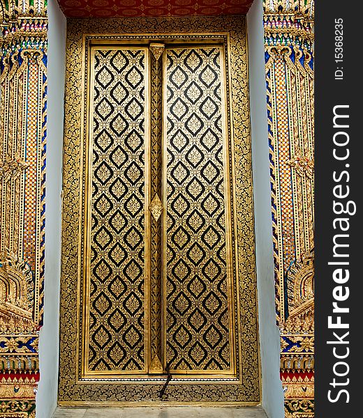 Thai church close door with gold painting