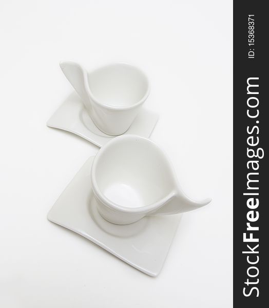 Two white cup for coffee on white background