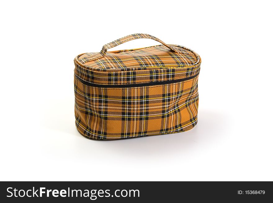 Checkered brown cosmetic bag on a white background