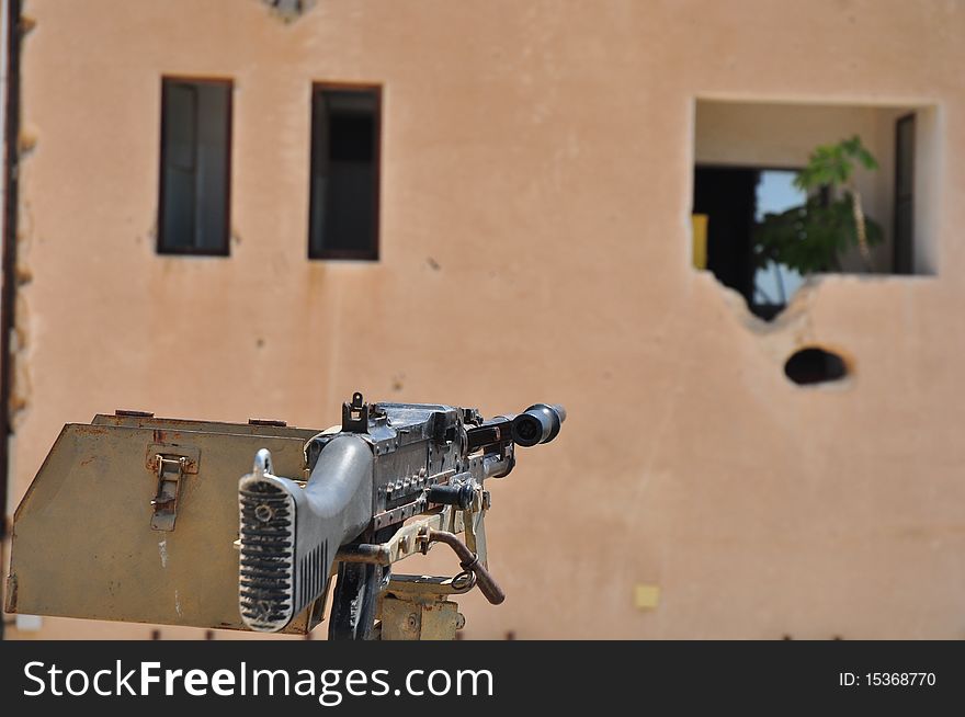 Machine gun mounted on top of the turret . Machine gun mounted on top of the turret .