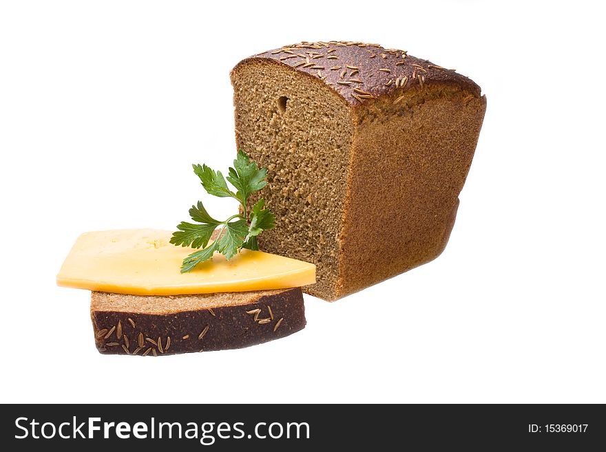 Chunk of rough bread with a cheese slice