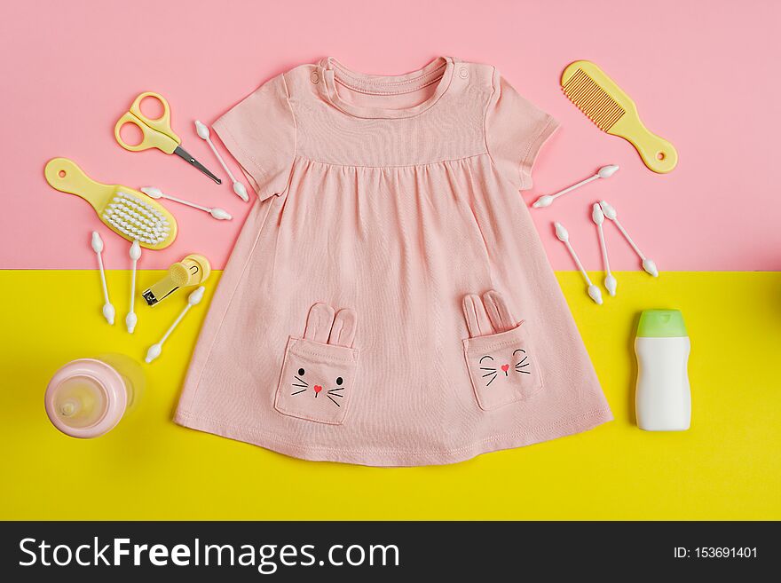 Baby girl dresseeding and necessities for baby
