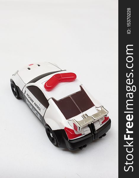 Scale police car model, isolated in the white background