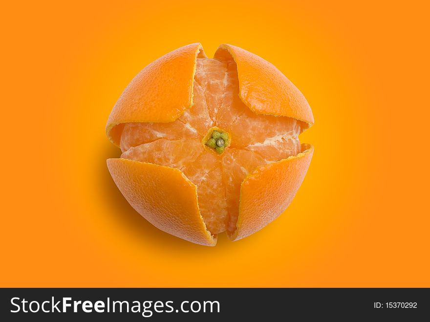 Whole ripe tangerine and it's peel devided into four symmetric parts. Clipping paths included. Whole ripe tangerine and it's peel devided into four symmetric parts. Clipping paths included
