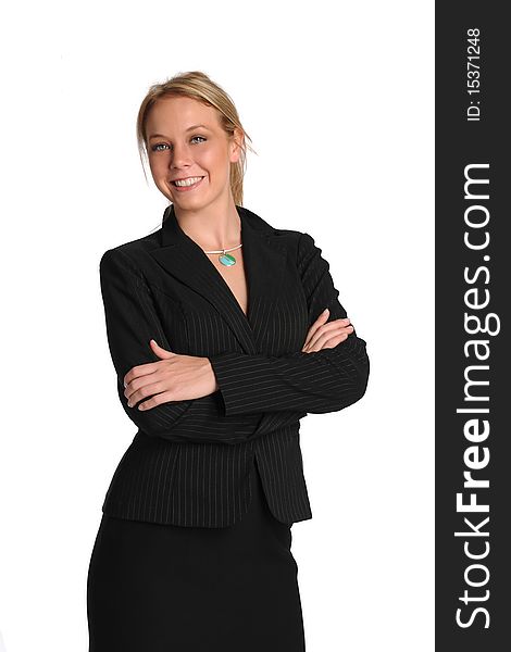 Young businesswoman smiling and with arms crossed on a white background