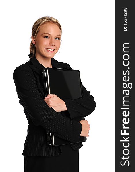Young businesswoman holding a laptop on a white background