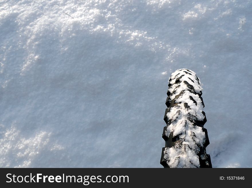 Bicycle Wheel On A Snow