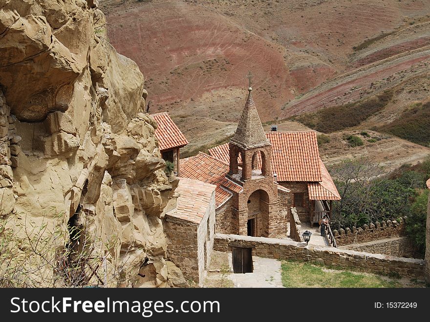 Georgia. David Gareja is a rock-hewn Georgian Orthodox monastery complex located in the Kakheti region of Eastern Georgia, on the half-desert slopes of Mount Gareja, some 60-70 km southeast of Georgia's capital Tbilisi. Georgia. David Gareja is a rock-hewn Georgian Orthodox monastery complex located in the Kakheti region of Eastern Georgia, on the half-desert slopes of Mount Gareja, some 60-70 km southeast of Georgia's capital Tbilisi