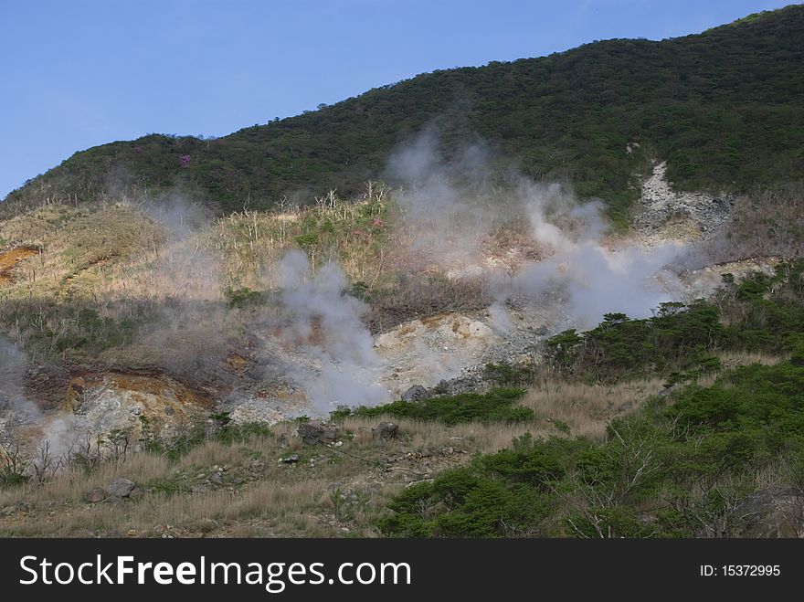 Hakone, Japan. The smelly hot steam is coming from underground thermal springs. Hakone, Japan. The smelly hot steam is coming from underground thermal springs