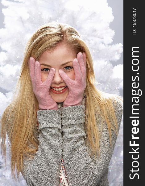 Teenage Girl Wearing Knitwear In Studio