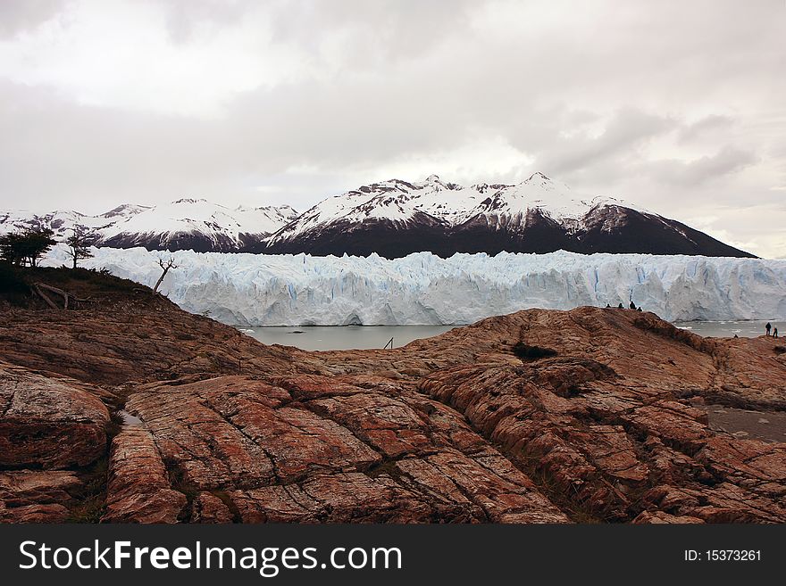 View to the glacier with nearby mountain. View to the glacier with nearby mountain