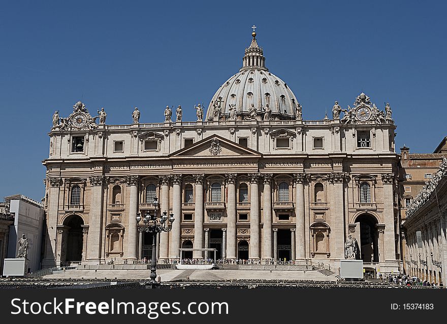 The Sct. Peters Church in Vatical City. in the foreground preparations for at speach by the pope, are being done. The Sct. Peters Church in Vatical City. in the foreground preparations for at speach by the pope, are being done.