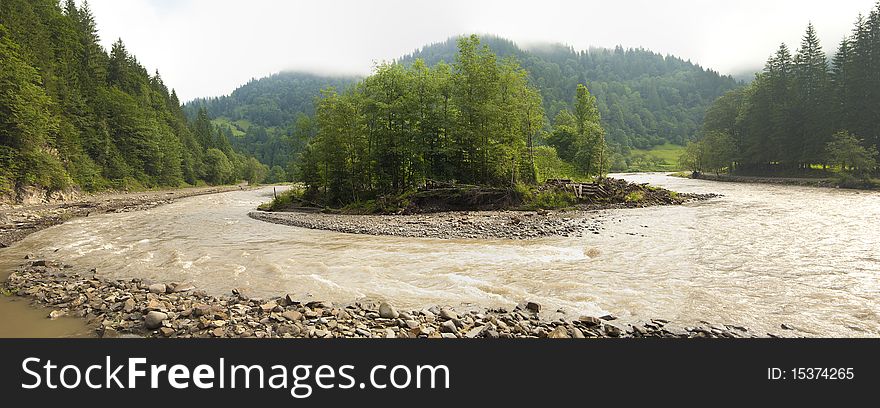 A mountain river landscape panorama in the ukrainian carpathians