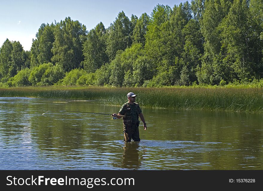 Photo of the fisherman on the river