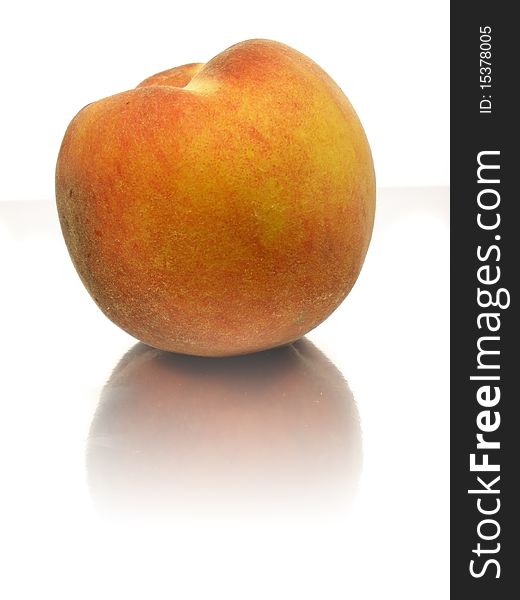 Peach on white background with reflection effect