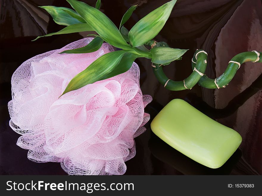 Scene with products for body care on a dark pink background