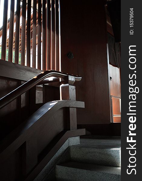 The staircase in a temple with a chinese style window