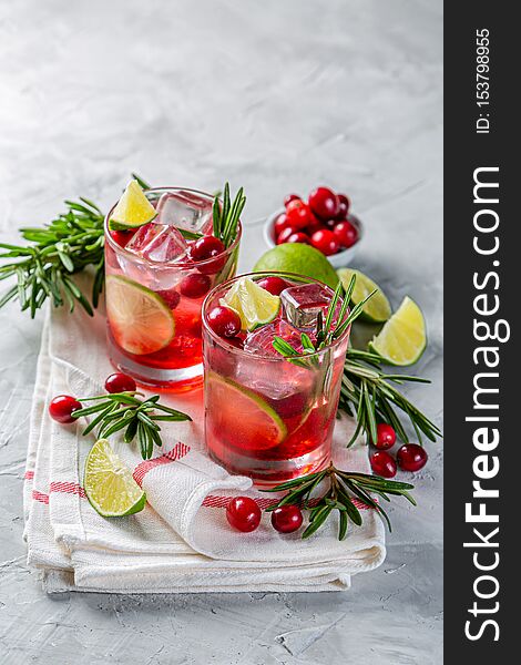 Cold season drink - cranberry and rosemary cocktail, copy space