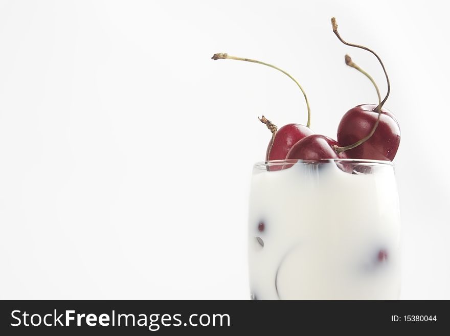 Delicious juicy cherries in milk