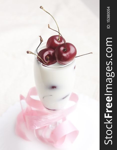 Delicious juicy cherries in milk