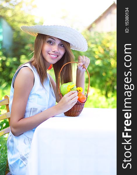 A beautiful girl sitting at the table. A beautiful girl sitting at the table