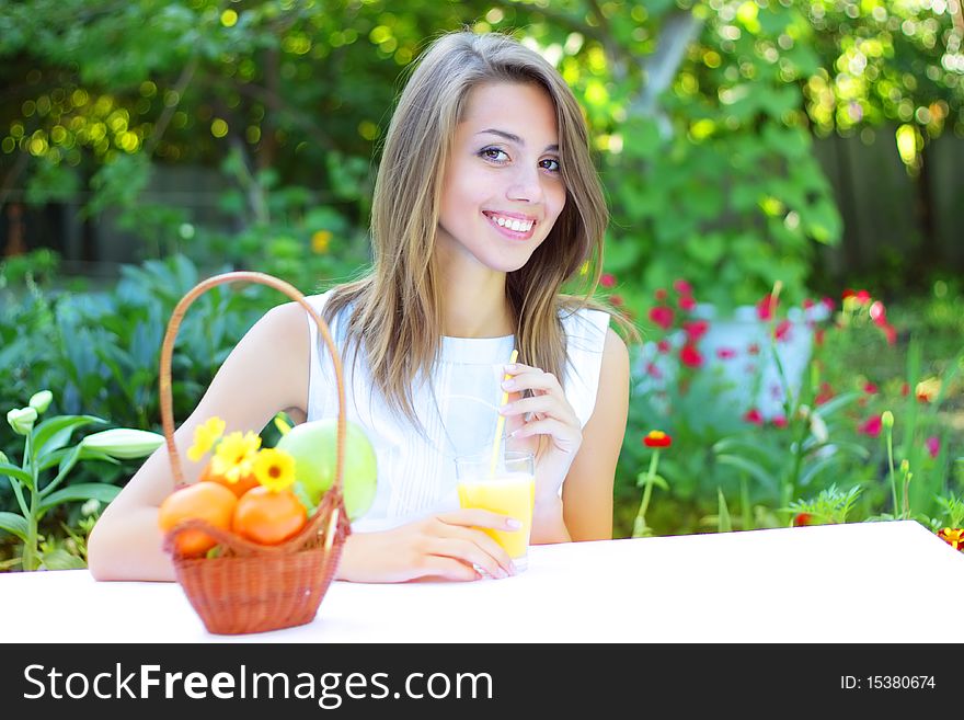 Beautiful girl sitting at the table