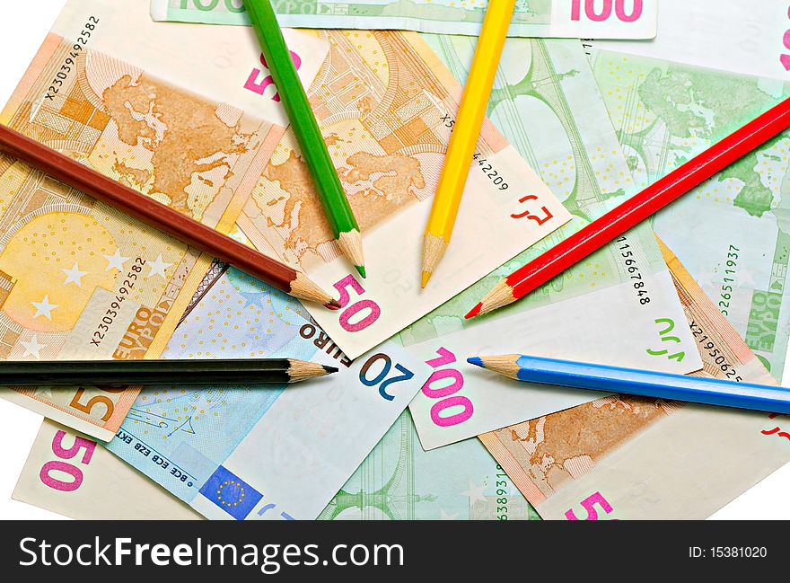 Colored pencils on a euro. Colored pencils on a euro.