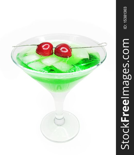 Alcohol green liqueur cocktail with ice and cherry. Alcohol green liqueur cocktail with ice and cherry