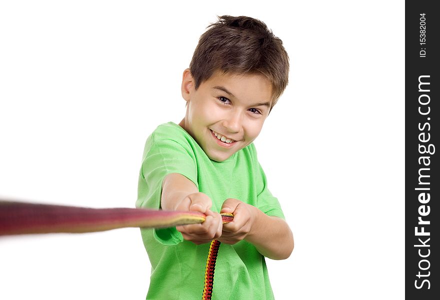 Boy pulling a rope - isolated on white