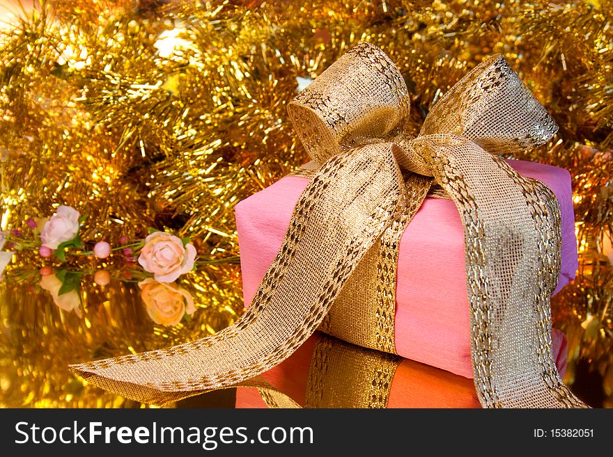 Pretty present with golden background